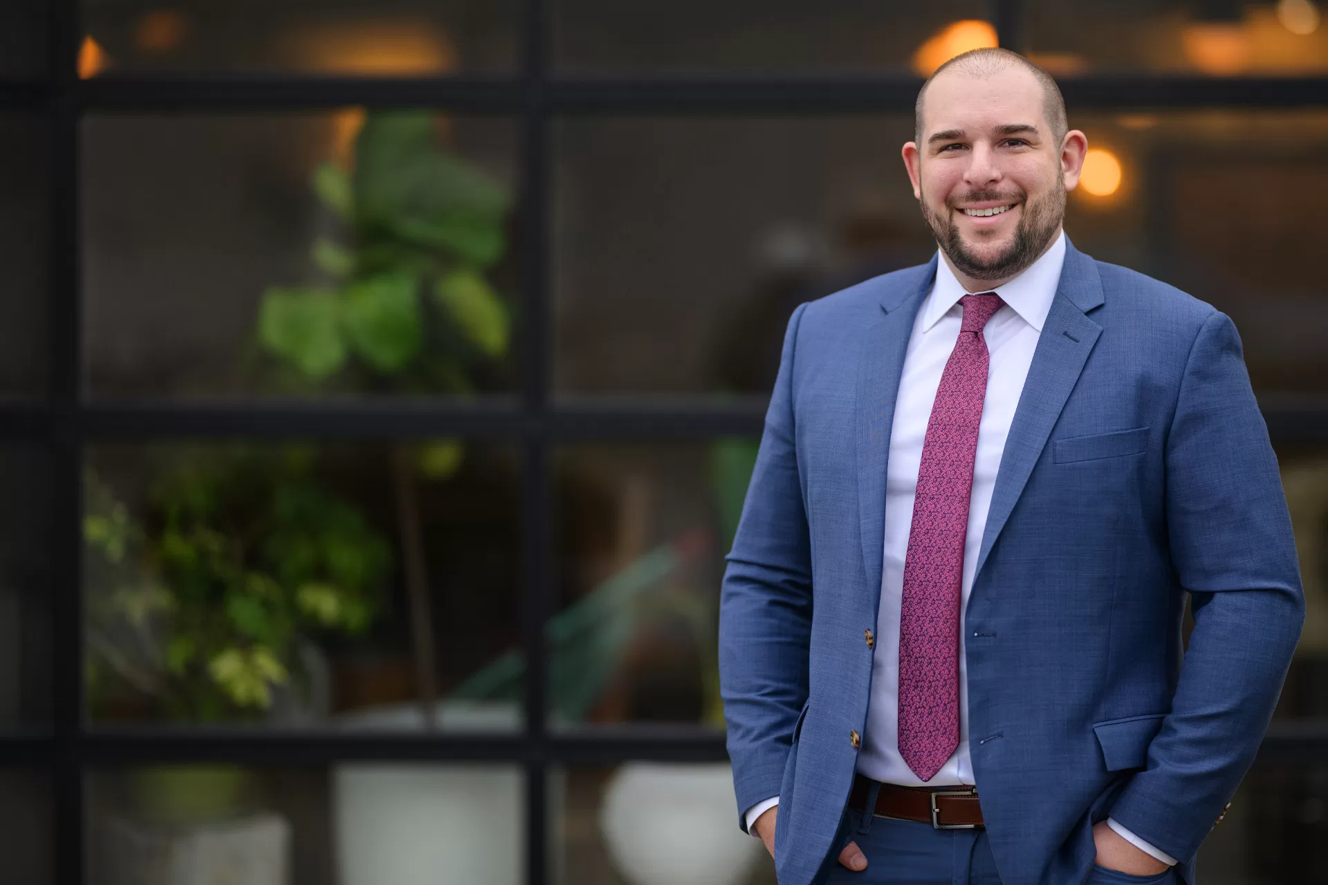 smiling man in a blue suit